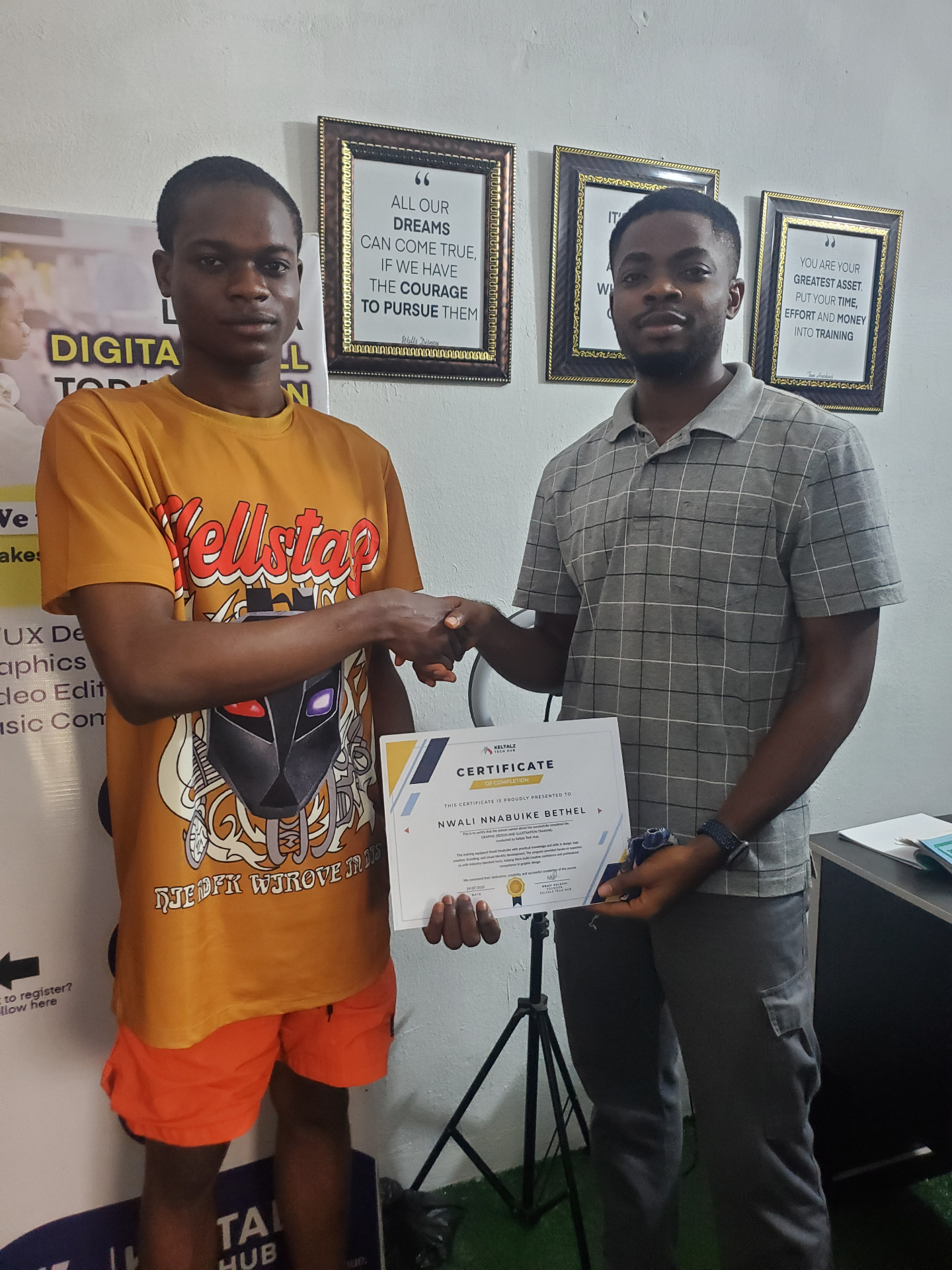 Keltalz Academy graduate receiving a completion certificate