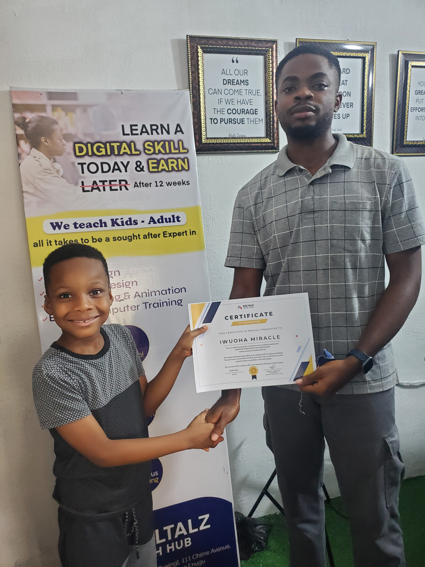 Keltalz Academy student receiving a certificate inside the hub