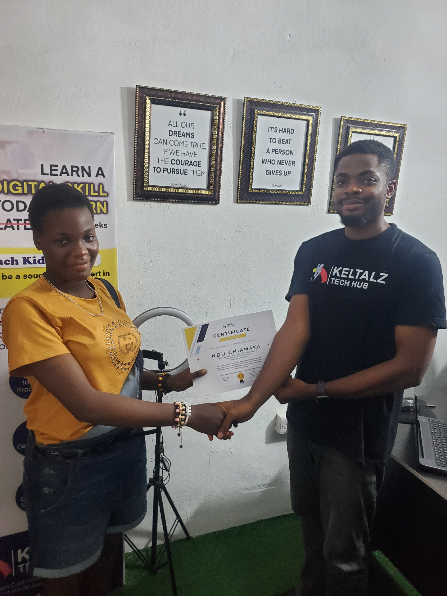 Keltalz Academy learner receiving a certificate of completion